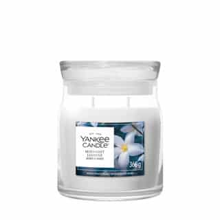 Yankee Candle Midnight Jasmine Signature Medium Jar with jasmine flowers on the label